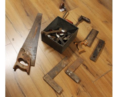 Quantity of vintage saws and hand tools 