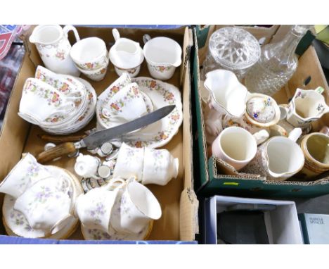 Two boxes of part tea sets, glassware, decorative jugs etc and antler handled carving knife and fork. This bladed product is 