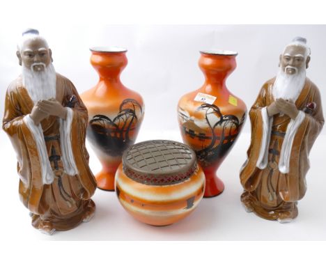 Three orange ceramic vases decorated with Oriental scenes and pair of Mudmen figures