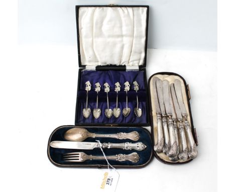 Boxed set of six Indonesian white metal spoons, set of six silver handled butter knives marked EE & Co and silver christening