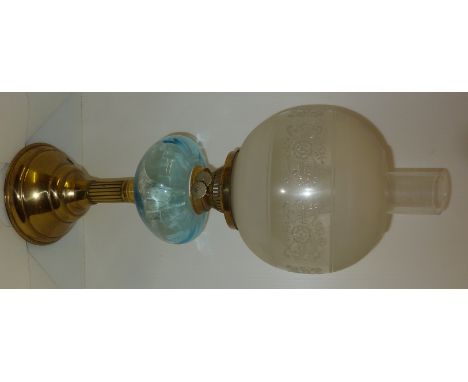 Modern brass paraffin lamp with blue glass reservoir and etched glass globe shade