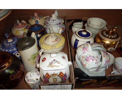 Two boxes of decorative teapots including Ringtons, Edwardian part tea service etc.