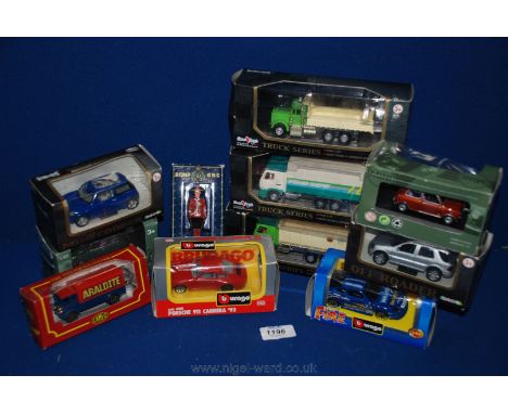 A quantity of boxed scale Model cars, trucks, etc. 