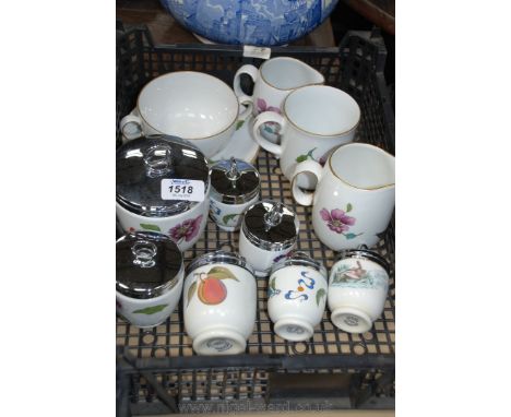 A quantity of Royal Worcester including milk jugs, cup, saucers, egg coddlers and mug.