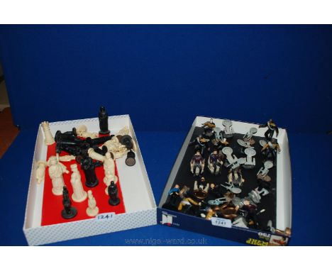 A Star Trek Chess Set and board and another chess set and board