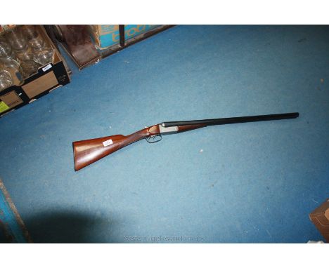 An Army & Navy Shotgun, 12 bore boxlock, non-ejector, 28'' barrel, re-sleeved in 1978, improved cylinder and 3/4 choke. A lig