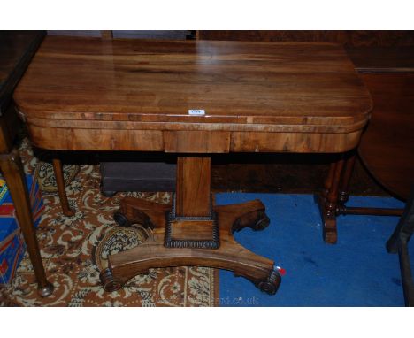 A Regency Rosewood rotating top fold-over Card Table, the rectangular top with rounded front corners, spinning and folding ov