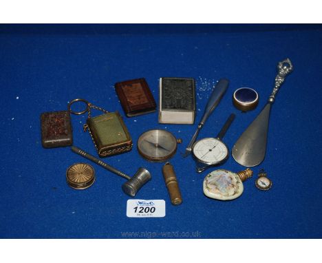 A box of small miscellanea including shoe horn, compass, matchbox cover, etc.