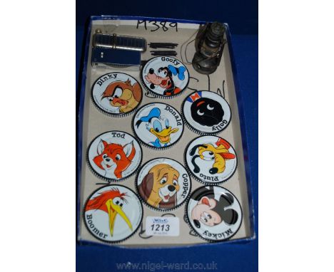 Two cigarette lighters including Roland and Sarome, nine Robertson jam pot Lids decorated with Disney cartoon characters and 