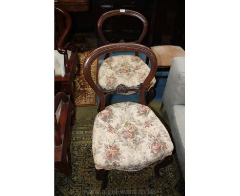 A pair of Victorian Mahogany framed Bedroom Chairs, carved hoop back with pierced fret cut and carved single bar back, floral