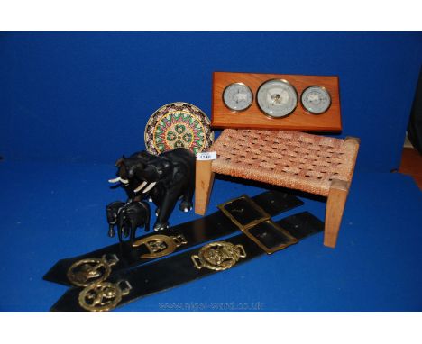 A Weatherman three in one Thermometer/barometer/hydrometer, a wall hanging metal plate, four ebony elephants a/f, two hanging