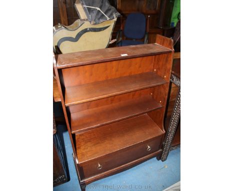 A Stag Mahogany finished open Bookcase, having two fixed and two adjustable shelves over lower single, full width drawer with