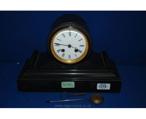 A Slate Mantle Clock with Roman numerals, with key.