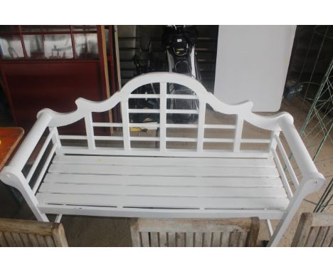 A white painted wooden garden bench