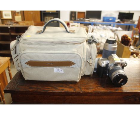 A Nikon F55 camera, lens and carry bag