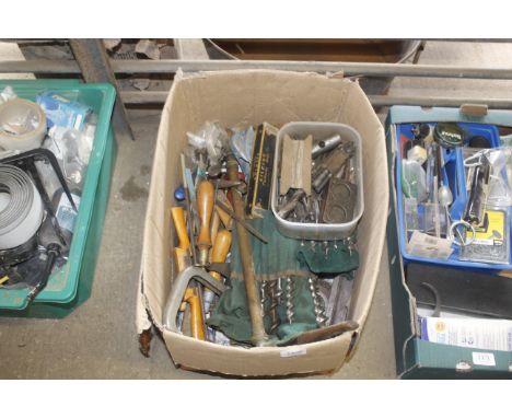 A box of various woodworking tools, drill bits, wood auger bits etc