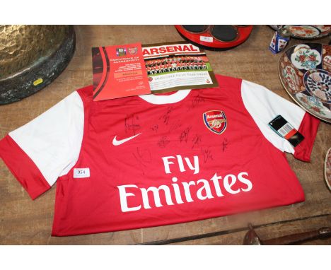 An Arsenal 2010 - 2011 First Team Squad signed shirt with certificate of authenticity