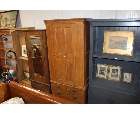 A scumble pine single door wardrobe fitted two short over one long drawer&nbsp;