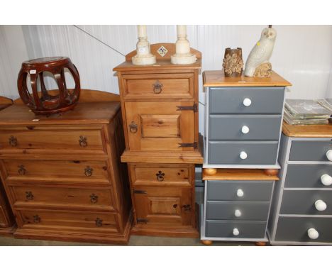 A pair of pine bedside cabinets fitted single drawer having tile decoration