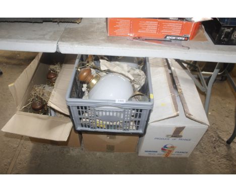 Three boxes containing various light fittings