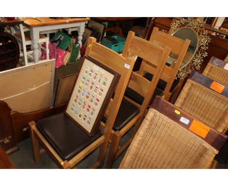 A set of four light oak bar back dining chairs together with a modern mirror