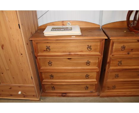 A pine chest fitted four long drawers having tile decoration 