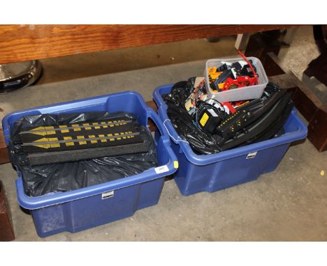 Two boxes containing various Scalextric, sold as seen