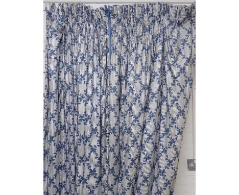 CURTAINS, a pair, lined and interlined in a blue oak leaf lattice design, each 118cm W gathered x 345cm Drop. 