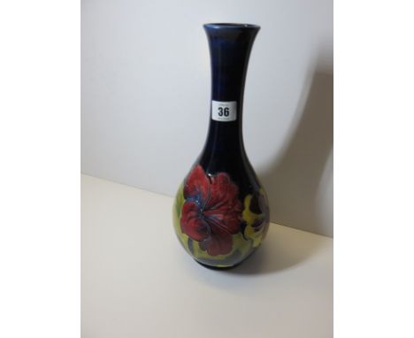 MOORCROFT,  blue ground "Hibiscus" pattern vase with Queen Mary label, 13" high