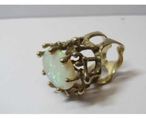 LARGE IMPRESSIVE OPAL RING, fabulous opal with super flash of colour, set in large heavy organic gold mount, size M