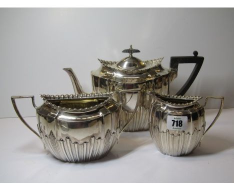 VICTORIAN SILVER TEA SERVICE, HM silver fluted oval bodied 3 piece tea service, ebonised handle and finial, Sheffield 1898/99