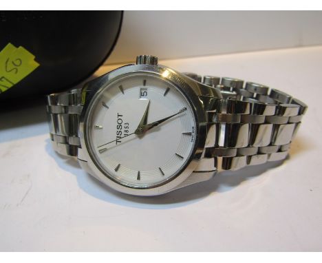 GENTLEMAN'S QUARTZ TISSOT WRIST WATCH in soft case with warranty card from Michael Spiers in Truro dated 09.03.2016