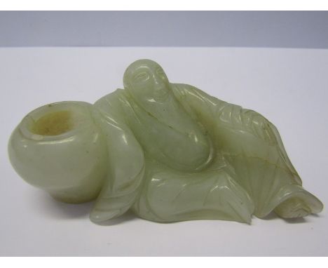 JADE CARVING, a white jade carving of a reclining figure ink pot