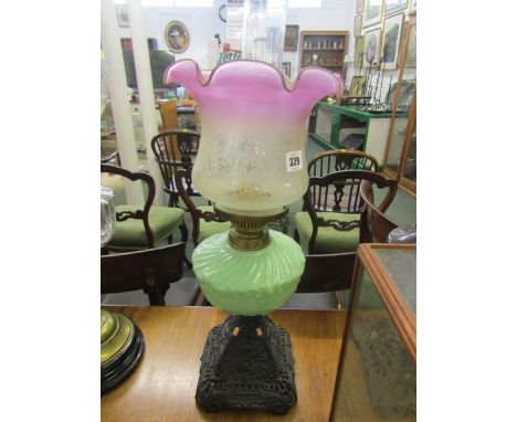 OIL LAMP, Edwardian cast iron based moulded glass reservoir oil lamp, frosted glass shade with some damage 