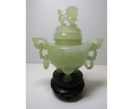 GREEN JADE, a carved model twin handled temple vase (restored) 