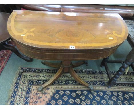 REGENCY ROSEWOOD TEA TABLE, a fold top satinwood cross banded card table on 4 inlaid splayed legs with brass claw castors, 36