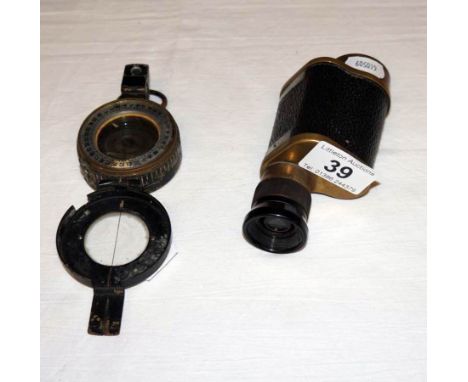 Old monocular and compass