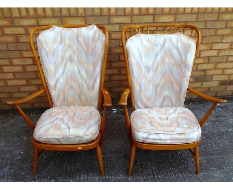 Two Ercol Windsor chairs - (loose cushion fillings not included in the lot) - Est £60 - £100