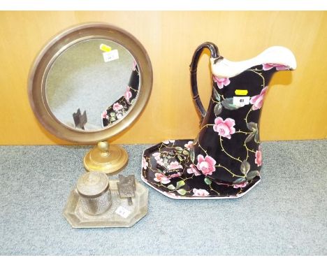 A brass dressing table mirror, a ceramic dressing table trio by Thos. Till & Sons, two early 20th century glass bottles with 