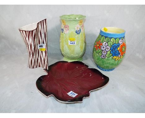 A Crown Ducal hand painted vase, a Melba Ware vase, an Arthur Wood brown zebra stripe vase and a Carlton Ware leaf dish (4)