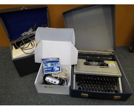 A Digi GR8 digital video recorder, an Olivetti Dora model typewriter and a Cabin Automat projector (3)