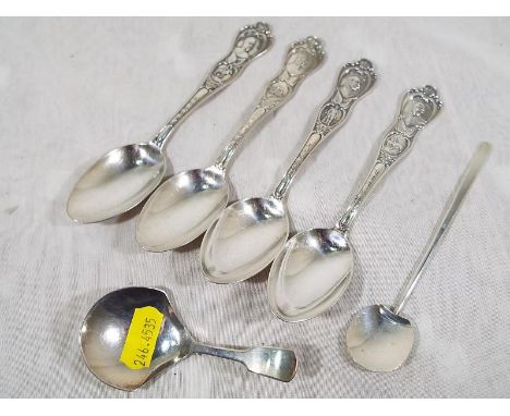 A William IV silver hallmarked tea caddy spoon, Birmingham assay 1836, an Edwardian silver tea spoon, Birmingham assay 1908 a