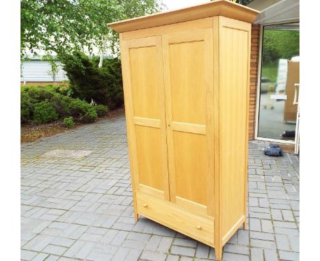 A good modern light wood wardrobe retailed by Marks & Spencer, ca July 2012, 195 cm x 114 cm x 60 cm (see also lots 82, 84, 8