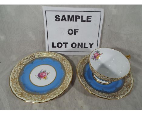 A six place setting tea service by Spode decorated in the Ruskin pattern and other tableware including Royal Grafton, Masons 