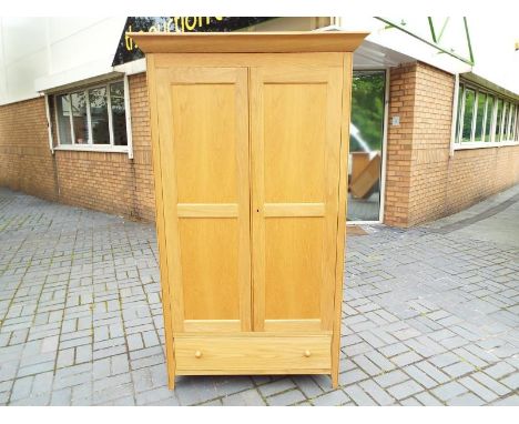 A good modern light wood wardrobe retailed by Marks & Spencer, ca July 2012, 195 cm x 114 cm x 60 cm (see also lots 83, 84, 8