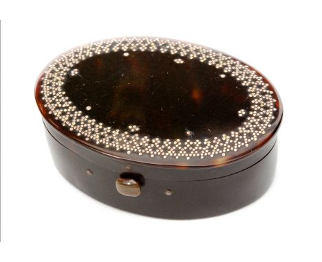 A 19th Century tortoiseshell and gold piquet work snuff box of oval form, width 7cm. 