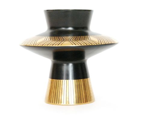 A Crown Devon 'Memphis' vase designed by Colin Melbourne of angular form with a wide collar neck decorated in black and gold,