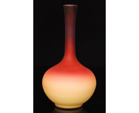 A late 19th Century Wheeling glass vase of globe and shaft form decorated with a dye away ruby to citron over opal interior, 