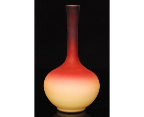 A late 19th Century Wheeling glass vase of globe and shaft form decorated with a dye away ruby to citron over opal interior, 