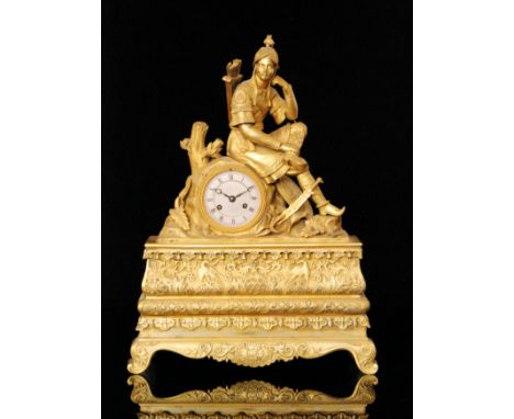 A late 19th Century French gilt mantle clock by Raingo Freres, Paris, the silvered dial below a figure of resting Oriental so